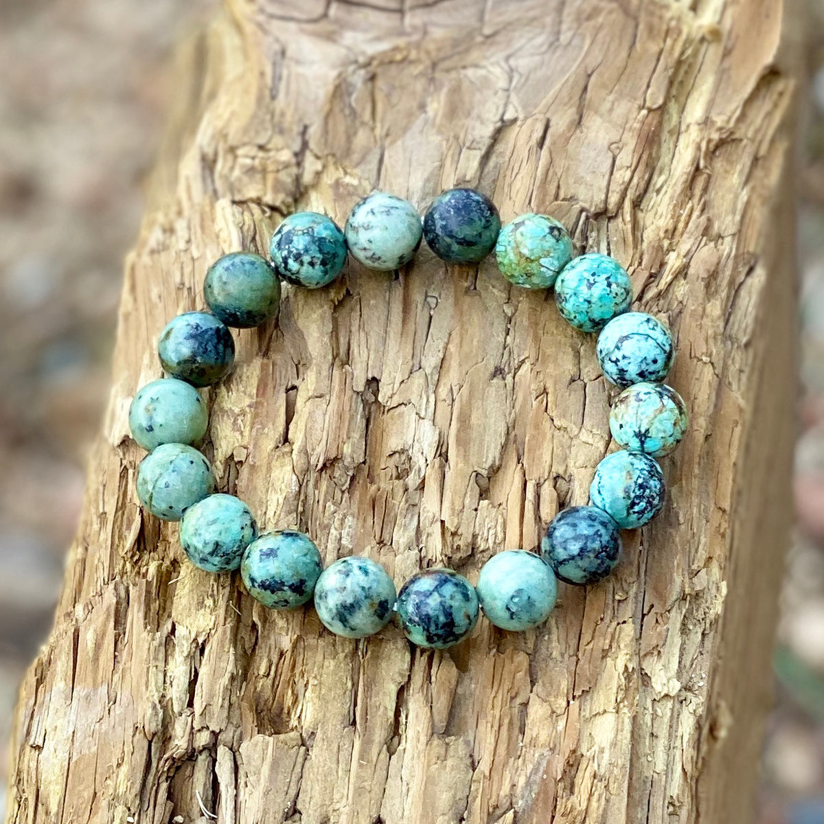 The Peaceful Waters Necklace, Earring and Bracelet Jewelry Set is created with Chrysocolla and African Turquoise. These bule and green gemstones bring you calming and soothing energy, promoting inner peace and tranquility.