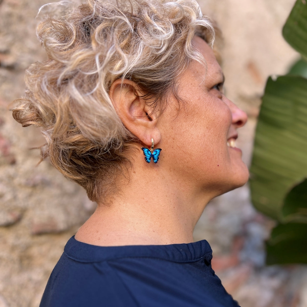 Let the "Joyful Butterfly Dance Earrings" be your mindful companions, encouraging you to dance through life with the carefree spirit of a butterfly.