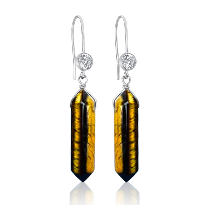 The Empowerment Enhancer Earrings made of Tiger Eye are a striking pair of earrings that embody the strength and confidence of the majestic tiger. Each earring features a polished Tiger Eye stone, which is known for its unique golden-brown color and distinctive chatoyancy, or "cat's eye" effect.