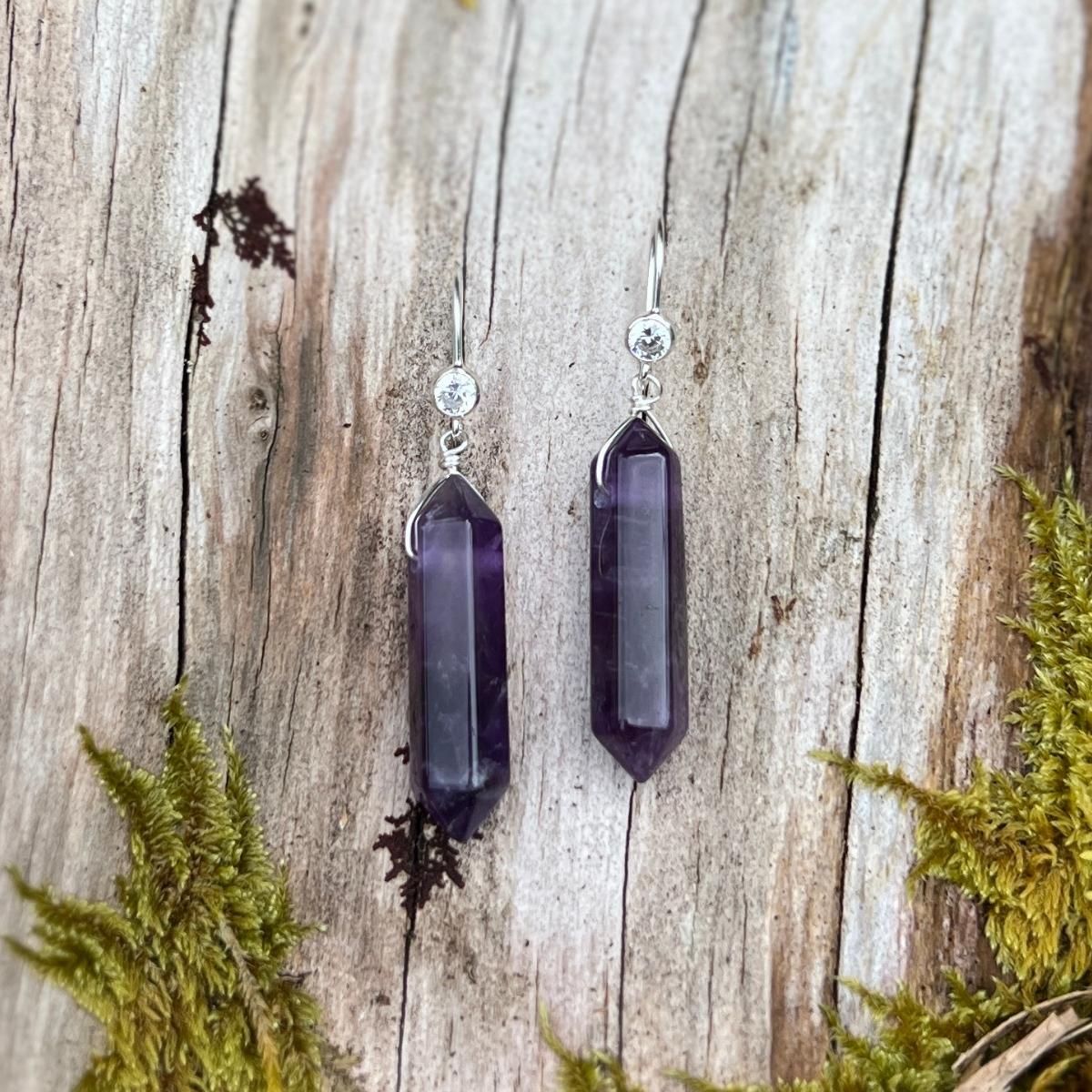 The Transformation Talisman Amethyst Earrings are a stunning pair of earrings that are perfect for those seeking to connect with their inner selves and embrace positive transformation.
