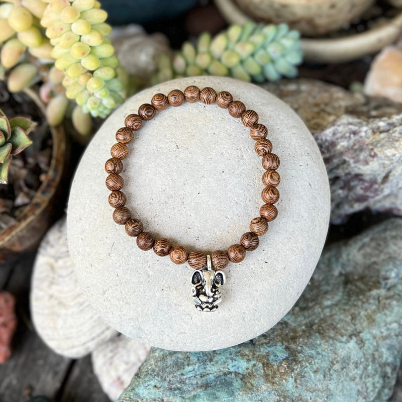 Embrace the fusion of nature and spirituality with "Ganesha's Wisdom - Wood Bracelet Set." Elevate your style while carrying the powerful symbolism of growth, strength, and overcoming obstacles with you. 