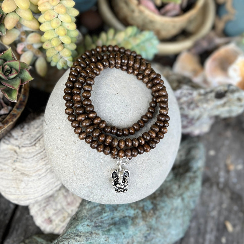 Embrace the fusion of nature and spirituality with "Ganesha's Wisdom - Wood Wrap Bracelet." Elevate your style while carrying the powerful symbolism of growth, strength, and overcoming obstacles with you. 