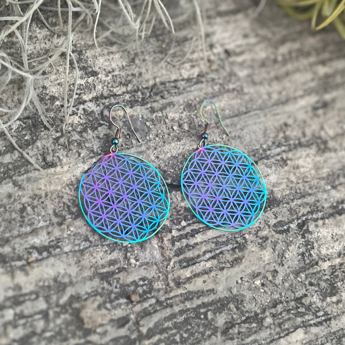 <strong>Wear the "Rainbow Flower of Life Earrings" to infuse your look with the vibrant colors of the rainbow and let them be a symbol of your unique, bohemian journey</strong>.