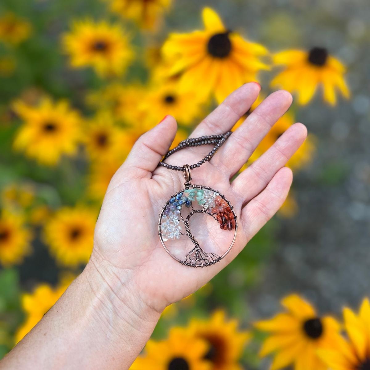 "Chakra Harmony Tree" is a captivating and spiritually meaningful necklace that celebrates the balance and alignment of the body's energy centers, known as the chakras.