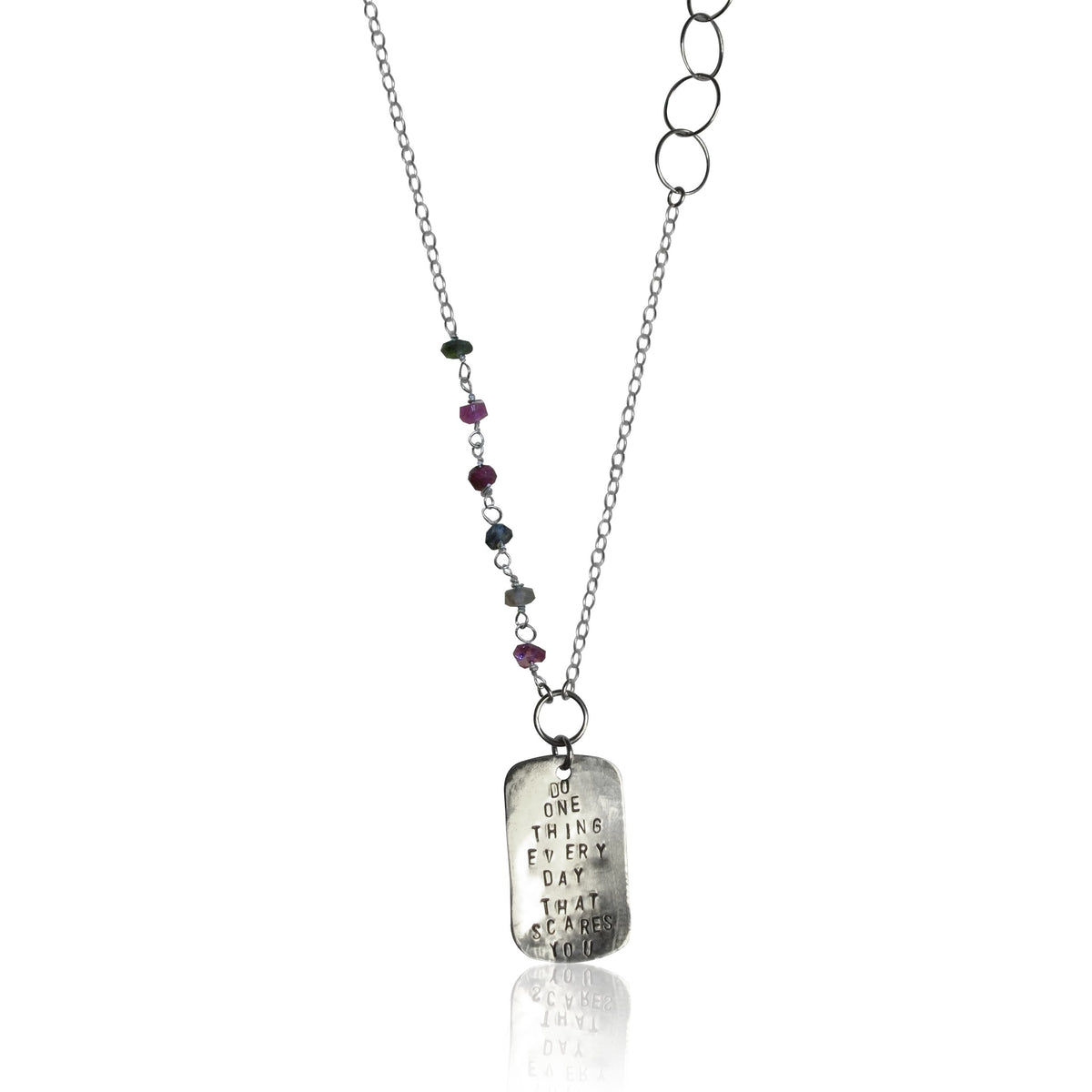 Gogh Jewelry Design's grounding necklace etched with: "DO ONE THING EVERY DAY THAT SCARES YOU"