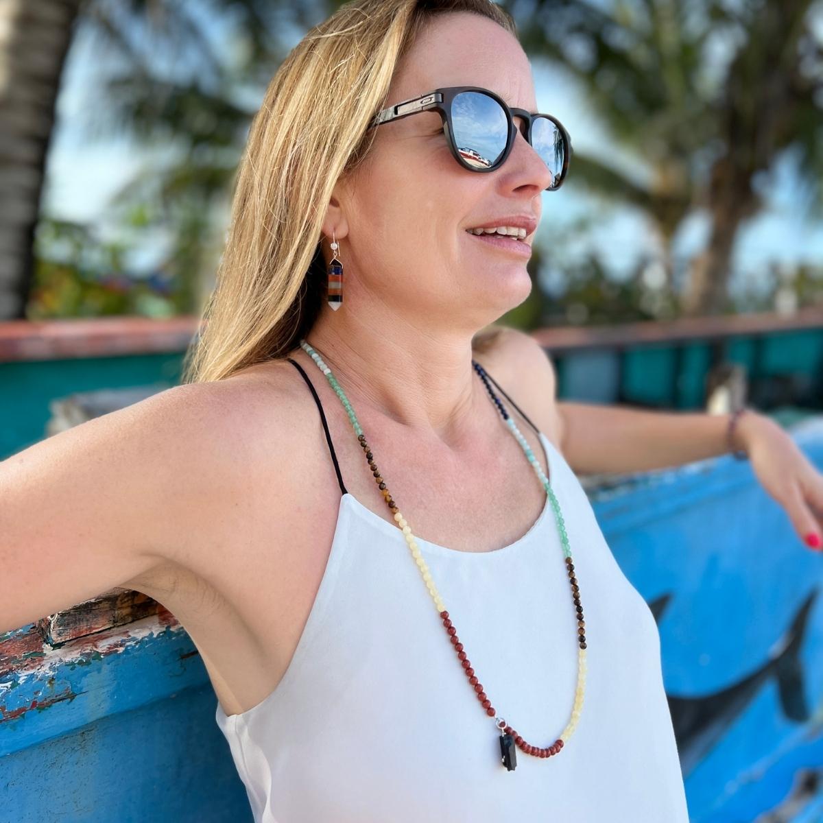 Get the Flowing Energy Chakra Necklace, Wrap Bracelet  and Earring Set with healing gemstones and feel the balance and harmony of your chakras. This beautiful jewelry set features gemstones for each chakra, promoting healing and positive energy. Order now and enjoy its benefits! 