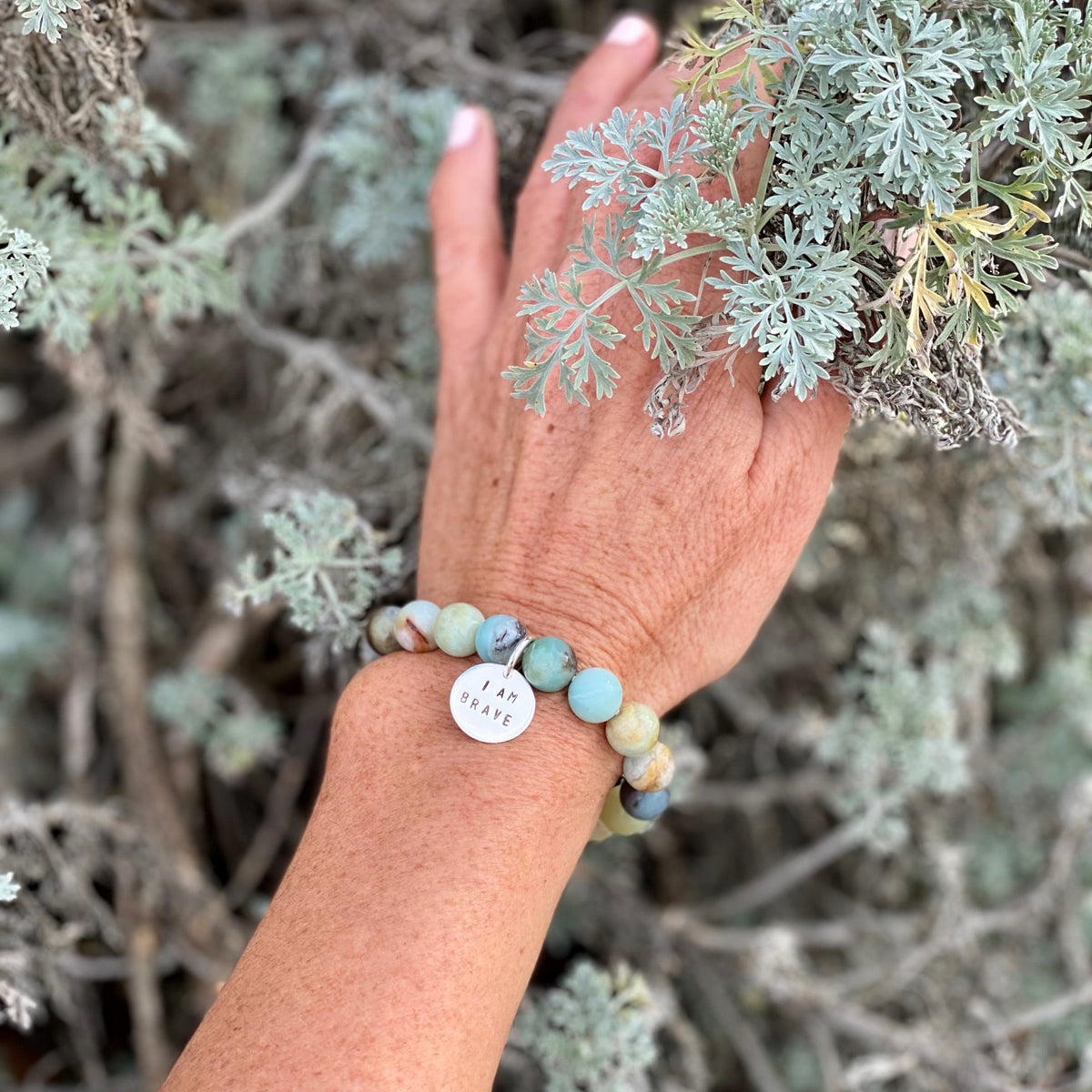 I am Brave Affirmation Bracelet with Amazonite for Courage.  Repeat the "I am Brave" affirmation every morning during your routine! This will set the intention for the rest of your day  (and perhaps life) - to travel into the unknown to try something new.