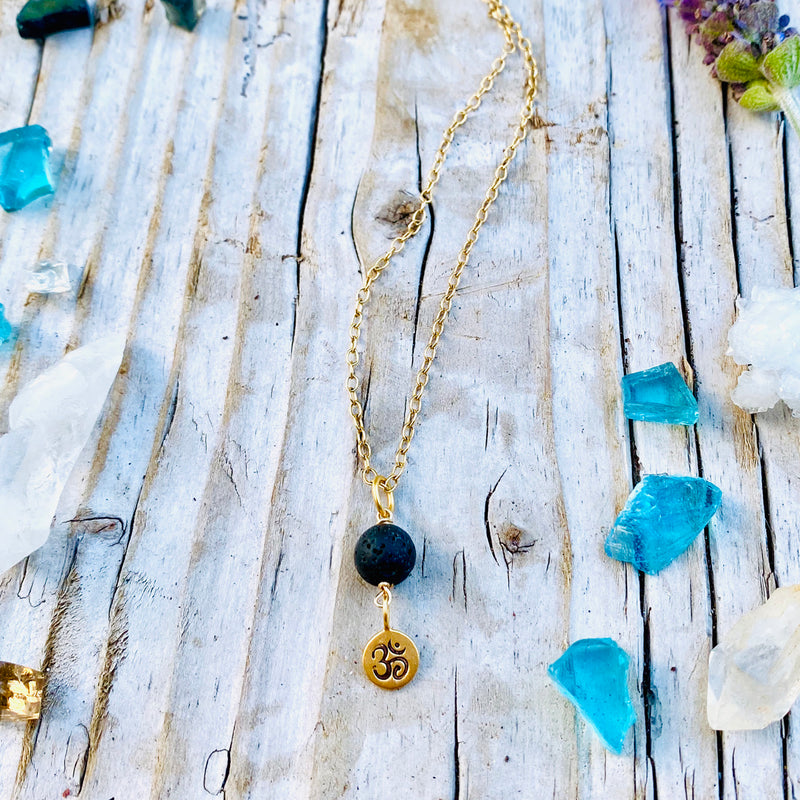 Yoga Inspired Gold Ohm Necklace with Lava Stone to Hear the Sound of the Universe