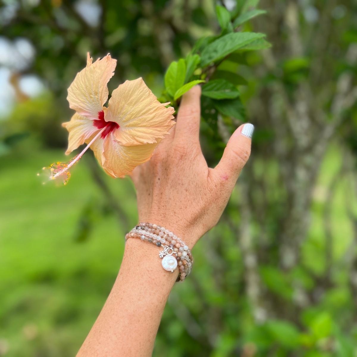 The Devine Sun & Moon Wrap Bracelet with Moonstone and Sunstone. Using the lunar energy of the moon and Moonstone can yield incredible healing results, both physically and mentally. Sunstone helps you to clear away limitations and negative energies by replacing them with light and high vibrations.