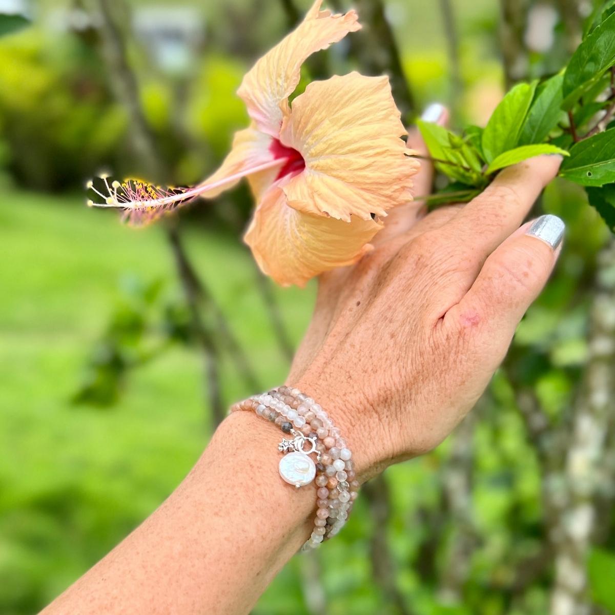 The Devine Sun & Moon Wrap Bracelet with Moonstone and Sunstone. Using the lunar energy of the moon and Moonstone can yield incredible healing results, both physically and mentally. Sunstone helps you to clear away limitations and negative energies by replacing them with light and high vibrations.