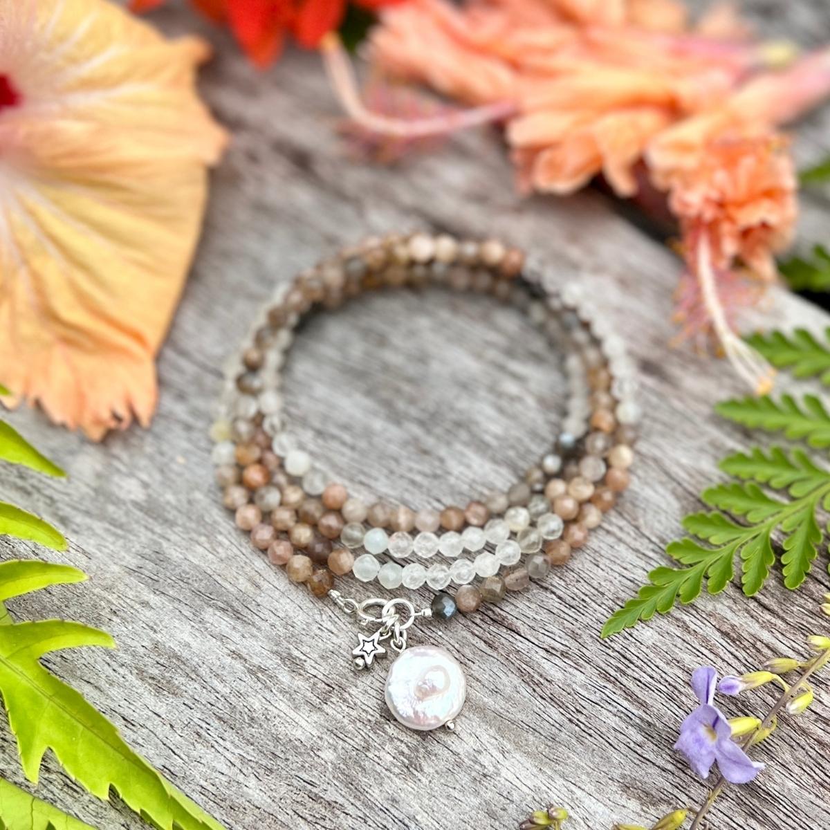 The Devine Sun & Moon Wrap Bracelet with Moonstone and Sunstone. Using the lunar energy of the moon and Moonstone can yield incredible healing results, both physically and mentally. Sunstone helps you to clear away limitations and negative energies by replacing them with light and high vibrations.