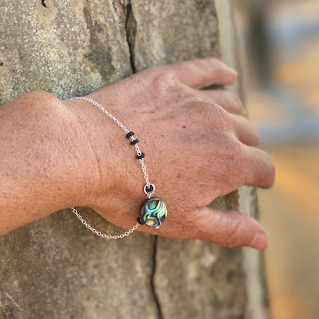 Zero Waste Bracelet with up-recycled SCUBA parts and Abalone pendant from the Pacific Ocean.