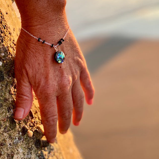 Zero Waste Bracelet with up-recycled SCUBA parts and Abalone pendant from the Pacific Ocean.