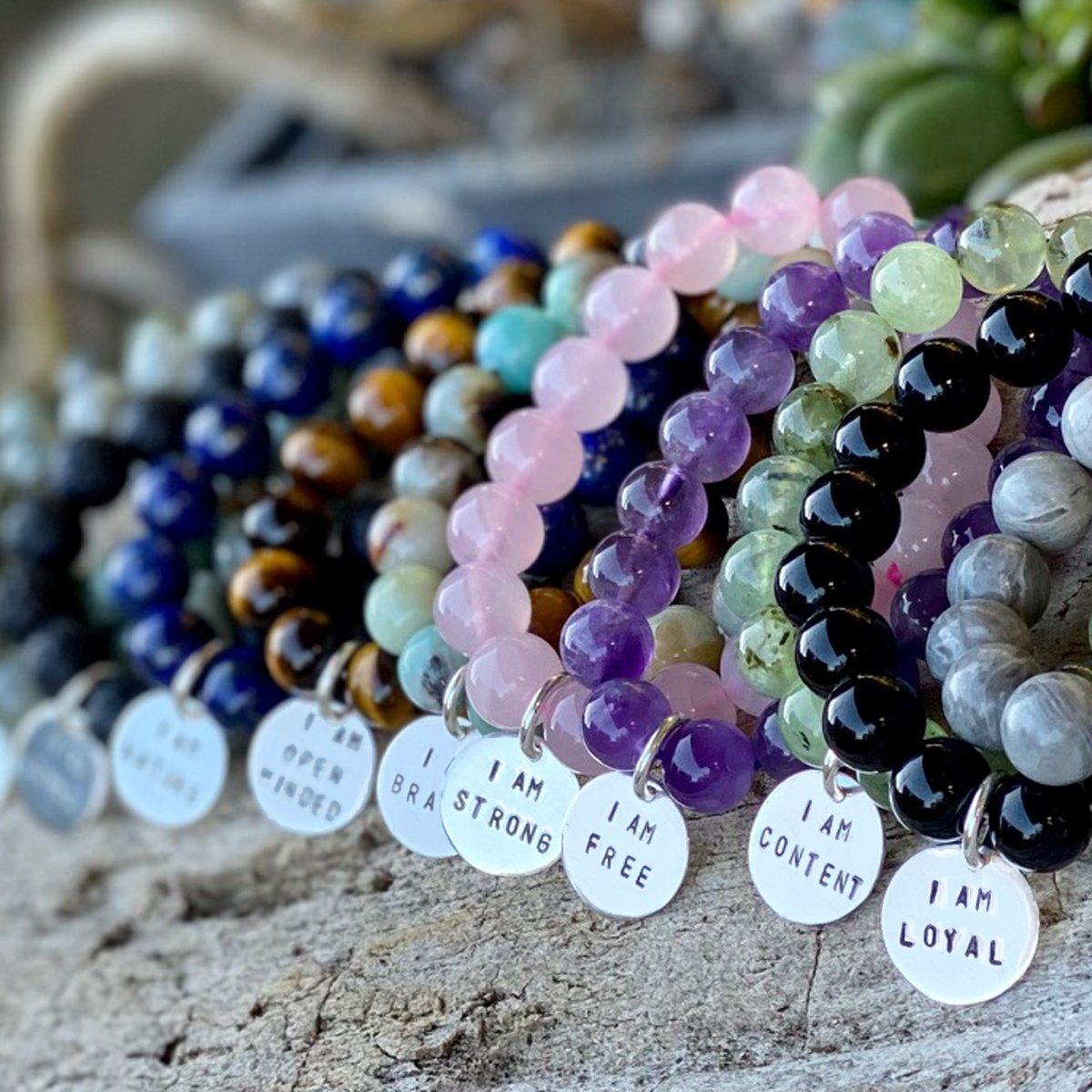 These sterling silver holistic healing affirmations say, "I am...". 