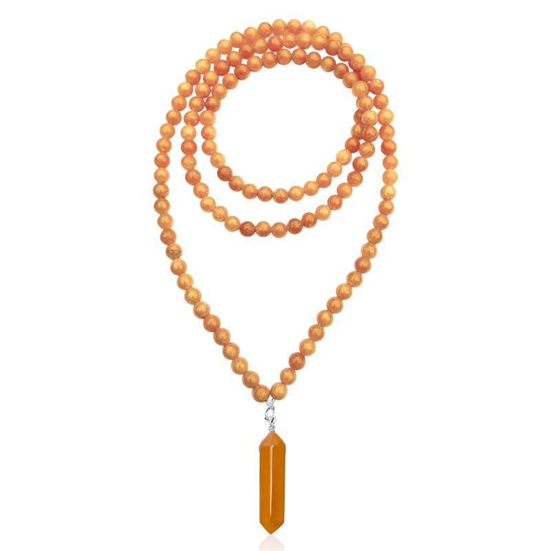 The Orange Blossom Aventurine and Jade Necklace is made of soothing and calming gemstones that promote emotional balance, creativity, and abundance.