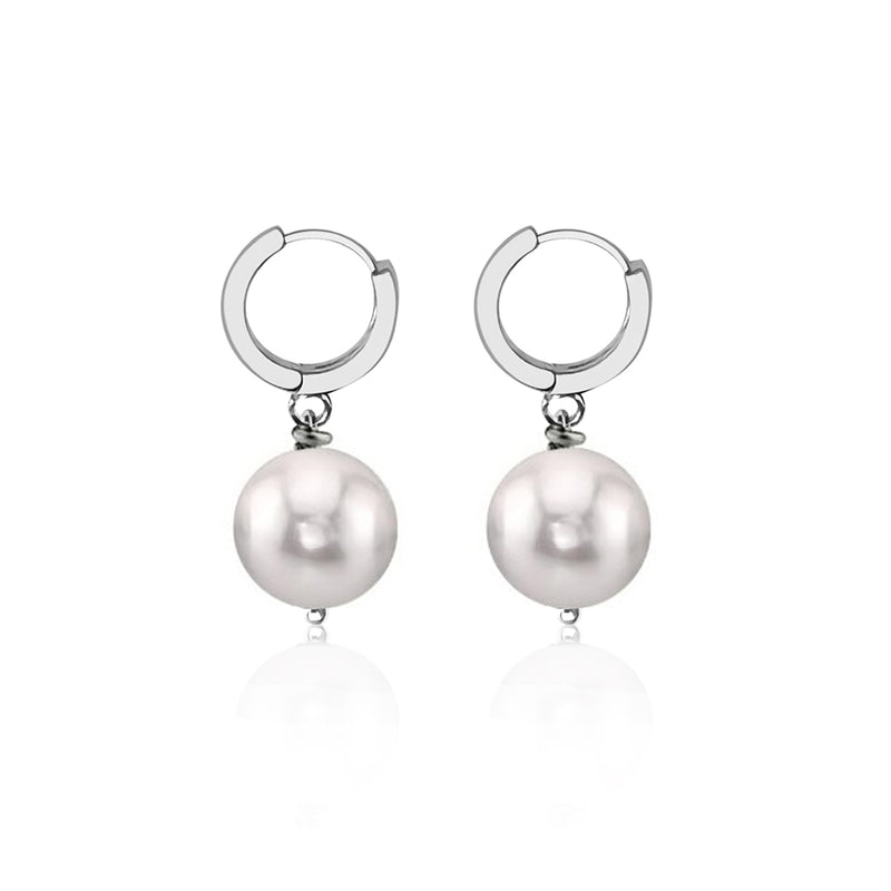 Introducing our new White Pearl Classic Elegance Earrings, a testament to both sophistication and timeless charm.