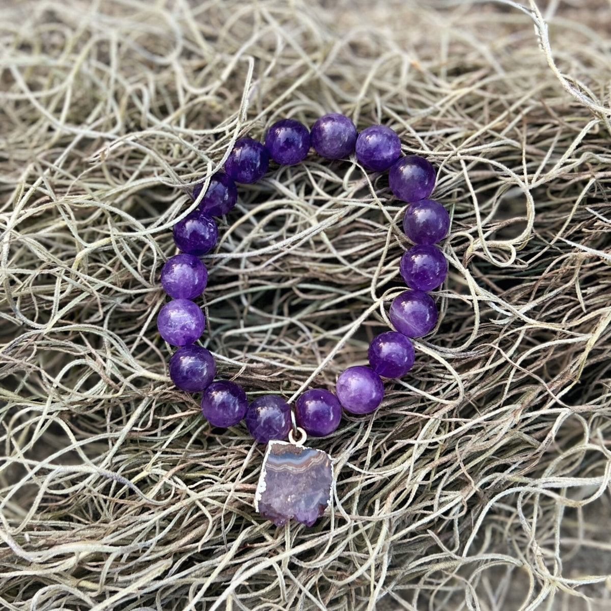 As you wear the Stress-Free Sanctuary Amethyst Bracelet, you'll feel a sense of peace wash over you, creating a sacred space where worries fade away and inner harmony prevails.