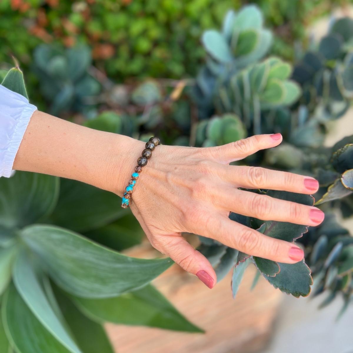  The "Peaceful Pathfinder" bracelet, a harmonious fusion of Bronzite and Turquoise, thoughtfully crafted to resonate with your inner journey.
