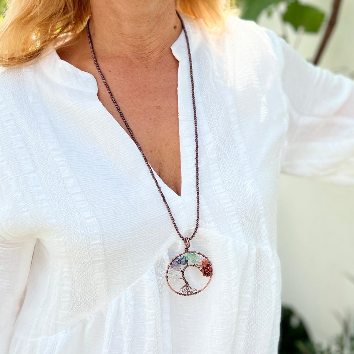 "Chakra Harmony Tree" is a captivating and spiritually meaningful necklace that celebrates the balance and alignment of the body's energy centers, known as the chakras.
