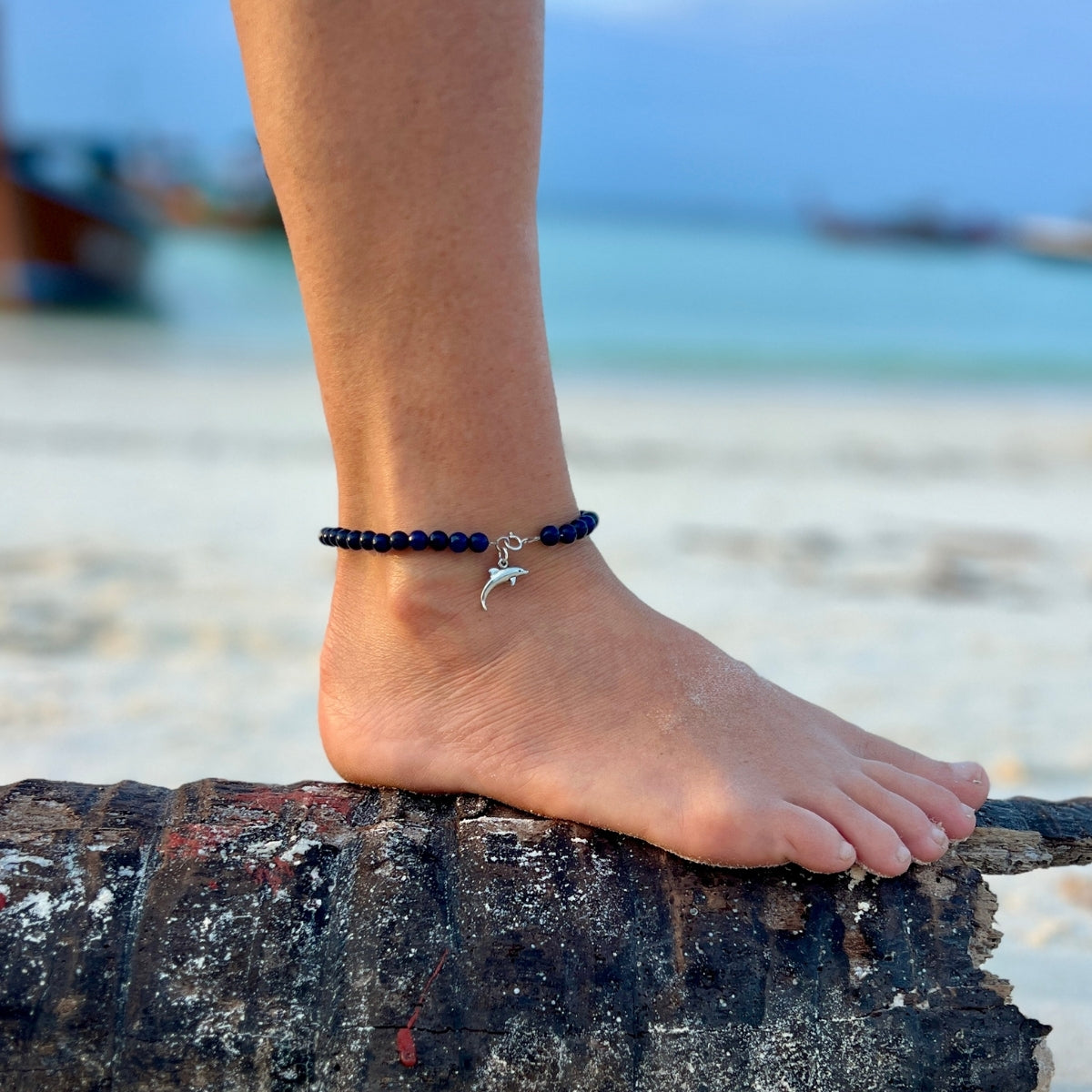 Slip on the Dolphin Spirit Anklet and let the magic of the beach accompany you wherever you roam. It's a symbol of your love for the sea and your carefree, barefoot soul.
