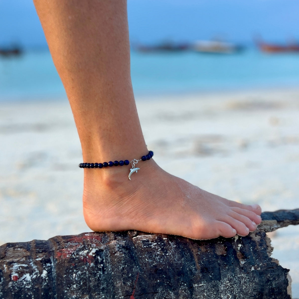 Slip on the Dolphin Spirit Anklet and let the magic of the beach accompany you wherever you roam. It's a symbol of your love for the sea and your carefree, barefoot soul.