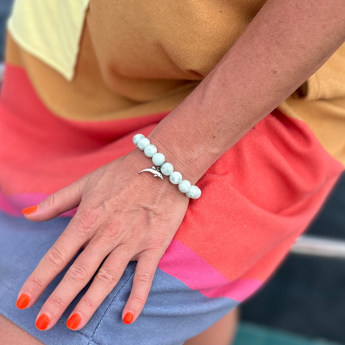 Whether you're a beach lover seeking a touch of coastal magic or a spiritual seeker embracing the tranquility of the ocean, the Dolphin Spirit Bracelet is sure to inspire and uplift your soul.