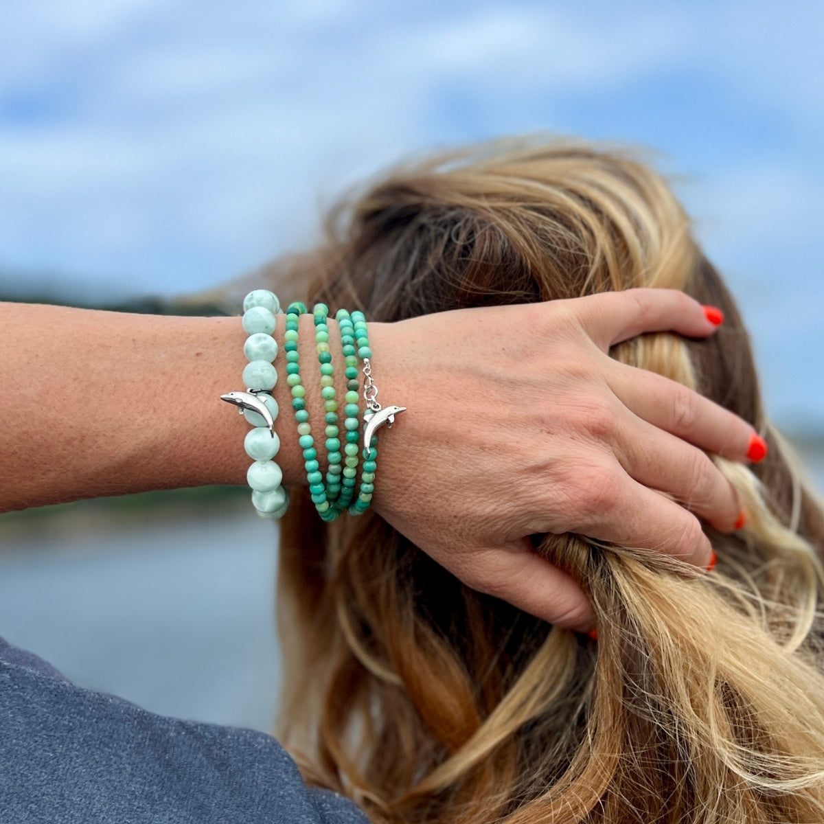 Whether you're a beach lover seeking a touch of coastal magic or a spiritual seeker embracing the tranquility of the ocean, the Dolphin Spirit Bracelet is sure to inspire and uplift your soul.