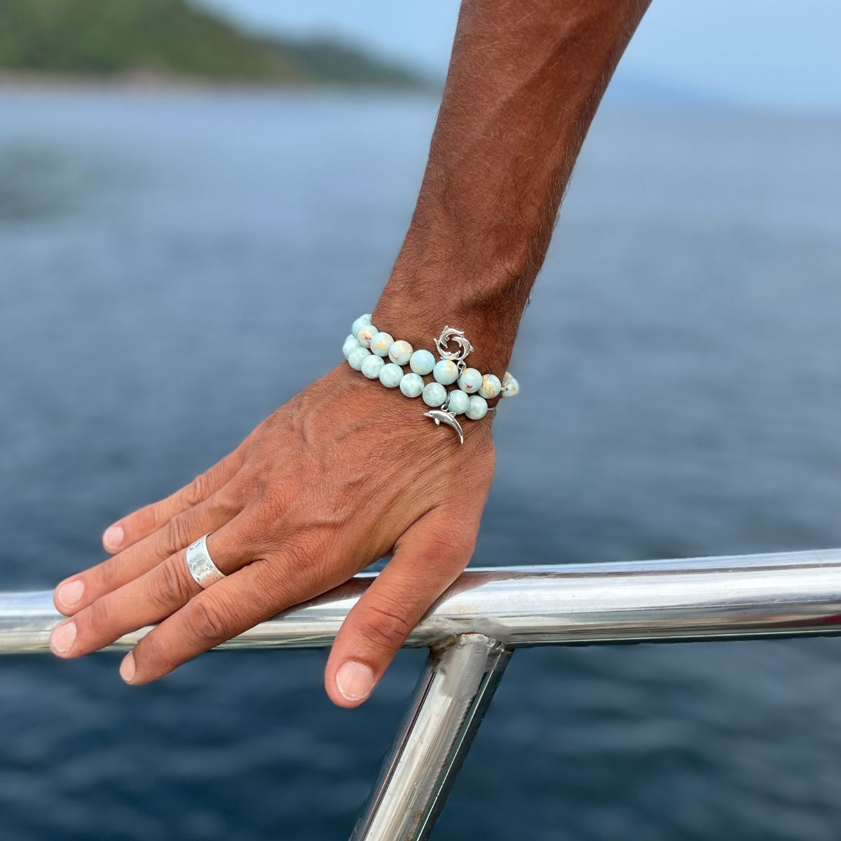 Whether you're a beach lover seeking a touch of coastal magic or a spiritual seeker embracing the tranquility of the ocean, the Dolphin Spirit Bracelet is sure to inspire and uplift your soul.