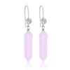 The Gentle Heart Rose Quartz Earrings are a beautiful and elegant pair of earrings that feature two polished Rose Quartz stones. Rose Quartz is known as the stone of love and is believed to enhance feelings of compassion, tenderness, and love towards oneself and others.