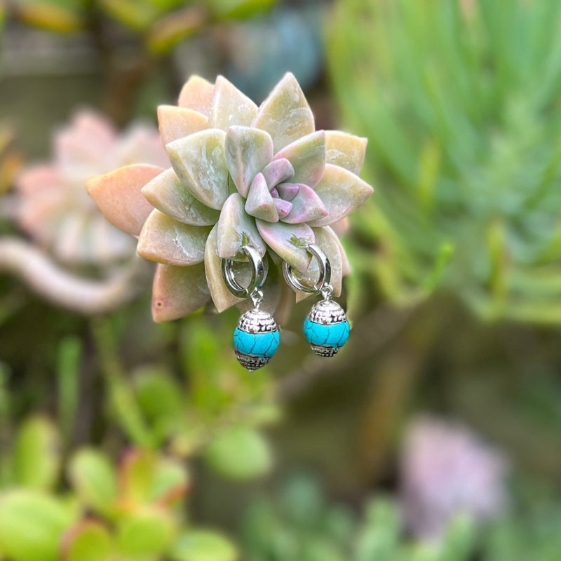 At the heart of the "Himalaya Harmony Earrings"  is a piece of Turquoise gemstone. Turquoise is a purification stone. Its energy is excellent for depression and exhaustion, it also has the power to prevent panic attacks. Turquoise is believed to bring luck.