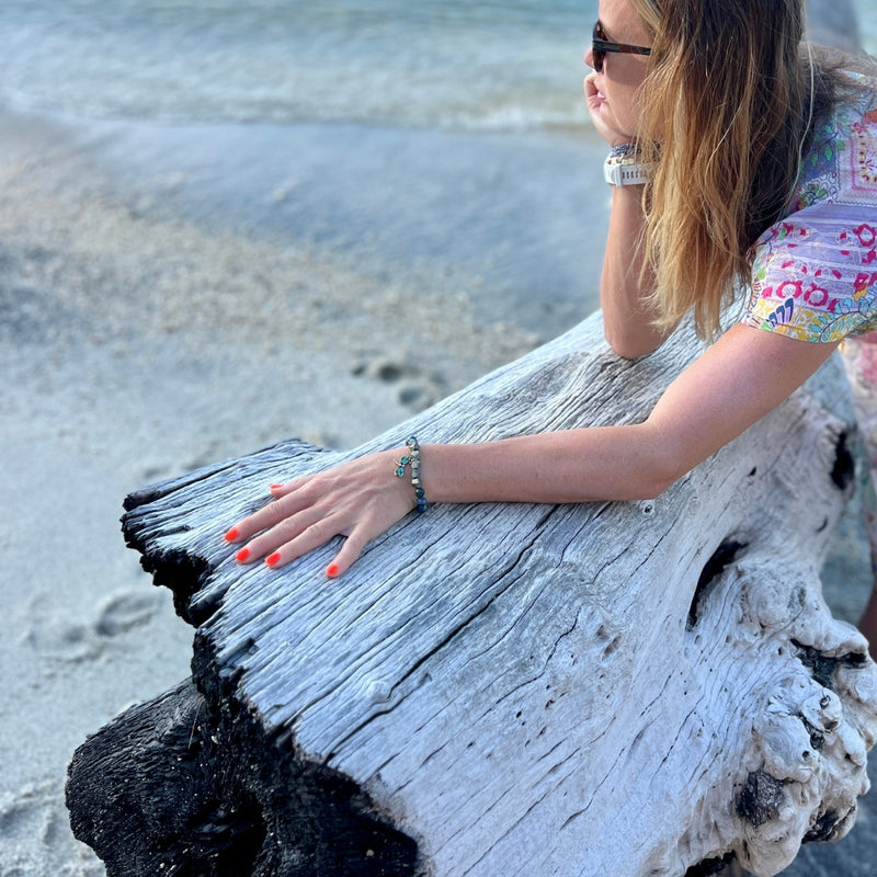 Embrace the harmony of transformation with the Dragonfly Whispers - Chrysocolla and Pyrite Bracelet, a symbol of empowerment and balance, guiding you to navigate life's twists and turns with resilience and grace.