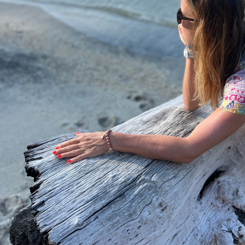 Immerse yourself in the journey of heartful transformation with the Dragonfly Whispers - Rhodonite Bracelet, your companion in embracing life's ebbs and flows with love and grace.