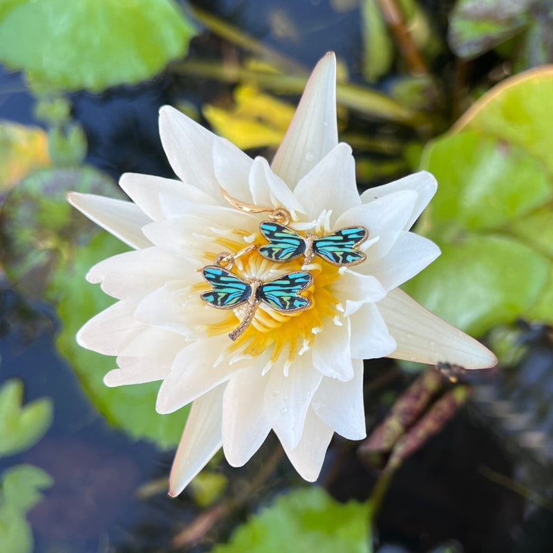 The Dragonfly Whispers Earrings are tokens of resilience and inner strength. Like the dragonfly's fleeting yet powerful flight, they inspire you to navigate life's transitions with courage and grace