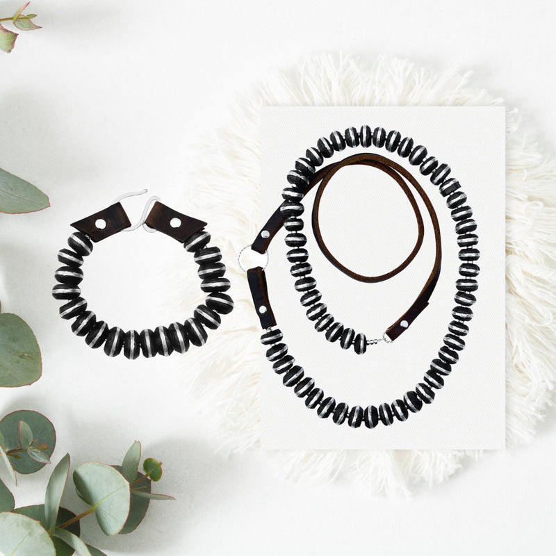 The "Mental Harmony: Ebony Wood Jewelry Set" is a piece that speaks to the soul, combining elegance with inner serenity.