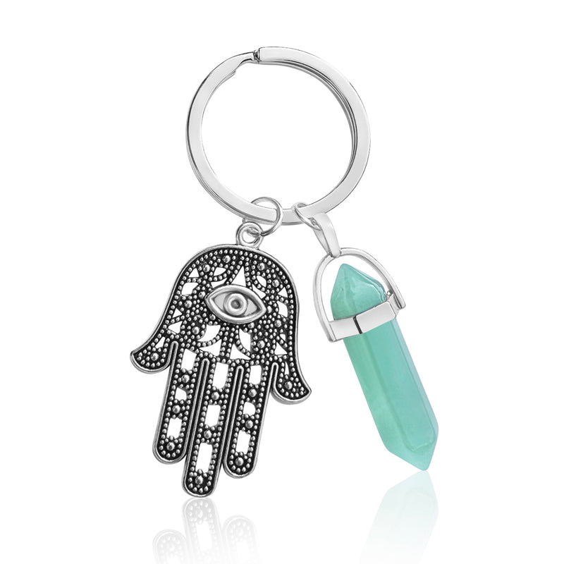 This Hamsa - Shielding Hand Keychain with Aventurine serves as a tangible representation of your intention to shield yourself from negativity while embracing the joyous and vibrant energy that life has to offer.