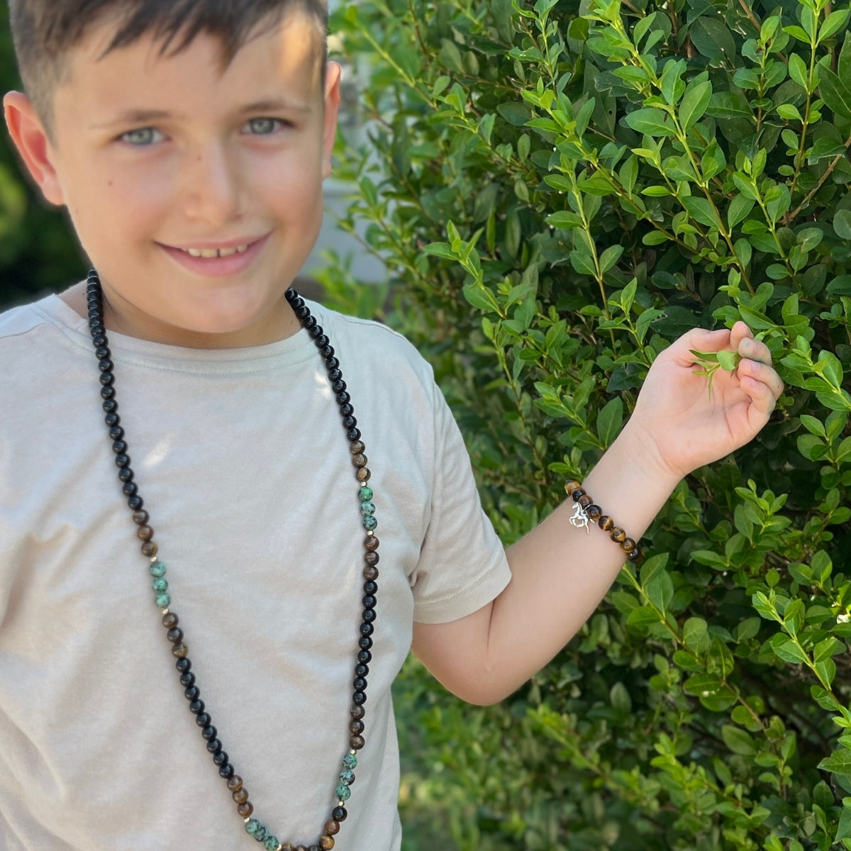 Wild Spirit - Horse Bracelet with Tiger Eye is a beautifully crafted accessory that captures the essence of freedom and strength, appealing to both kids and adults alike.