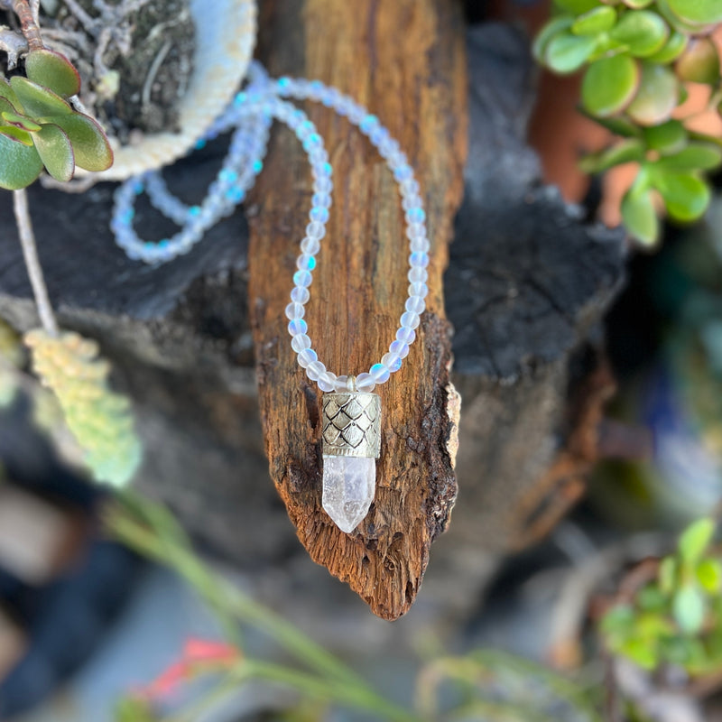 This Mermaid's Sanctuary Necklace is for anyone who needs both protection and peace—a shield that doesn't harden you, but instead surrounds you with light.
