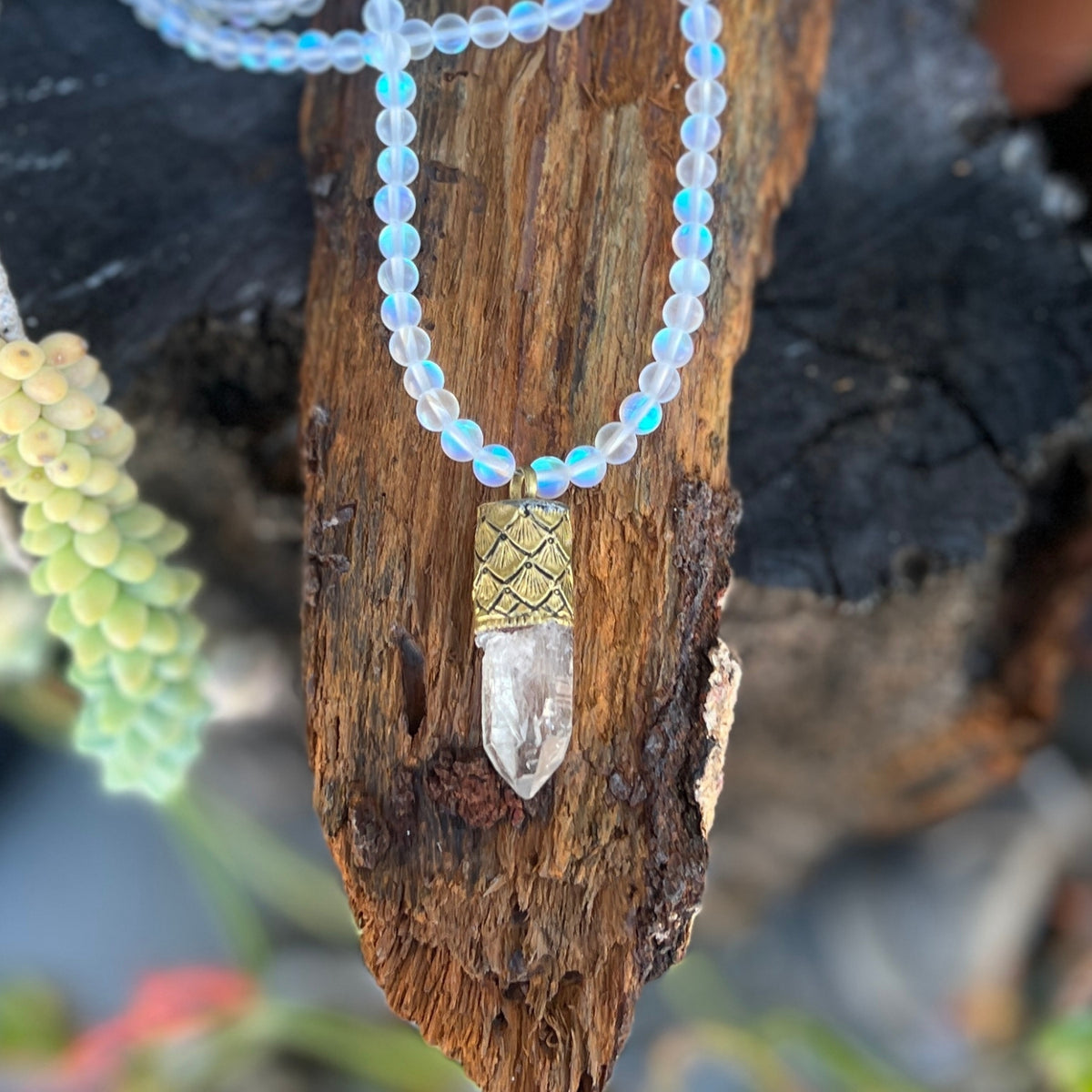 This Mermaid's Sanctuary Necklace is for anyone who needs both protection and peace—a shield that doesn't harden you, but instead surrounds you with light.