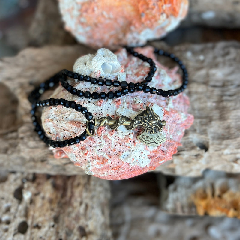 I created this Shadow Guardian Necklace for anyone who is facing something difficult.