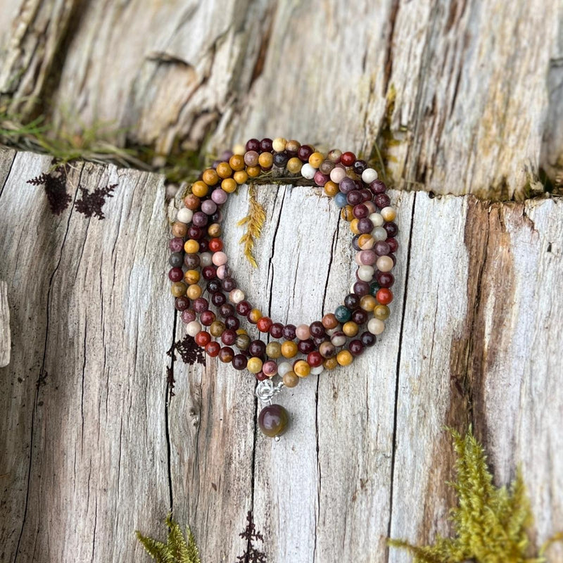 A bracelet made of Mookaite that enriches one's trust and love for Mother Earth., This Serene Symbiosis Mookaite Wrap Bracelet has the ability to ground one's mind, heart, and soul to the planet and connect with all sentient beings, creating a peaceful and harmonious coexistence.