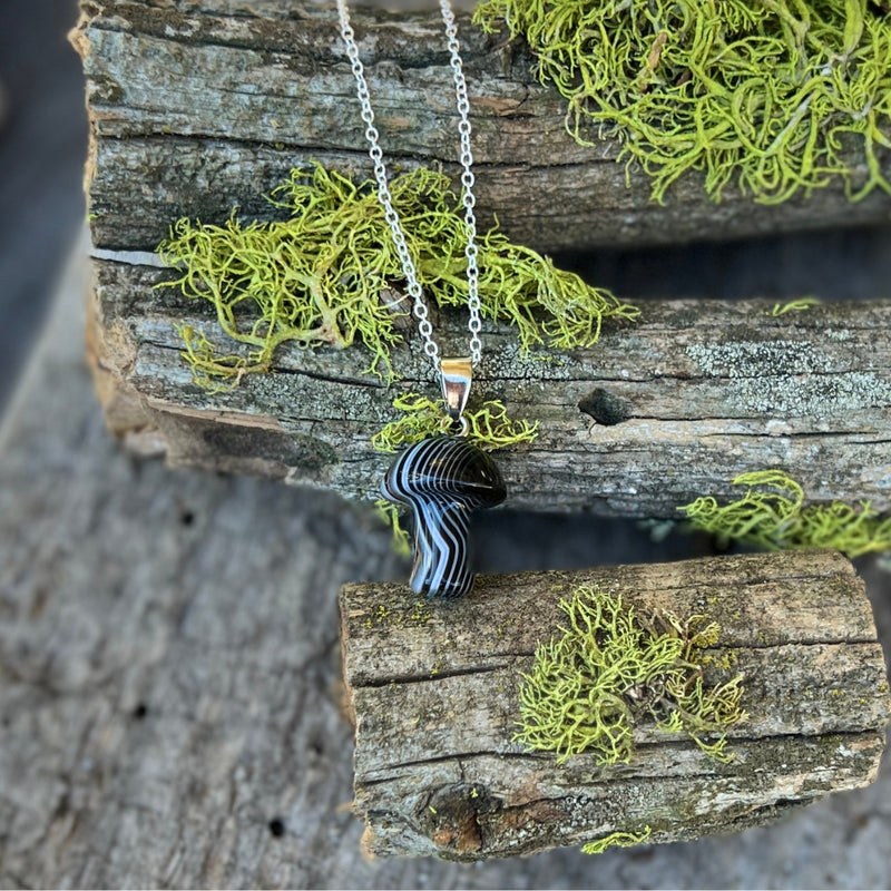 Wearing the Resilient Mushroom Necklace is an embodiment of resilience, transformation, and the journey toward self-assurance. 