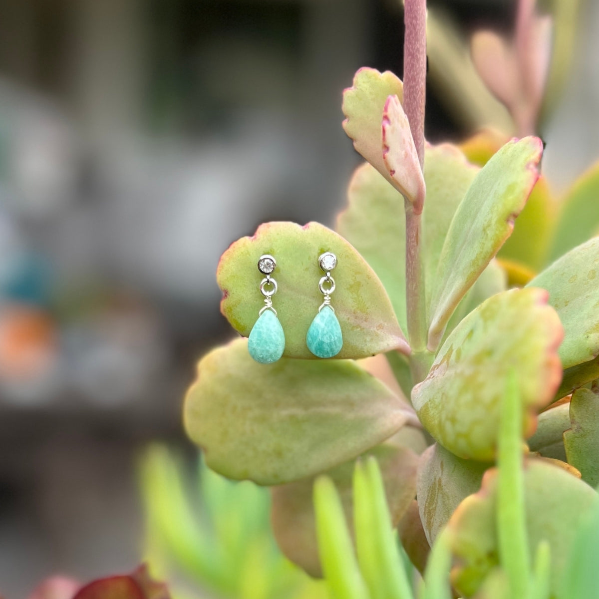 The captivating Petite Sparkle - Amazonite Earrings are meticulously crafted for individuals who resonate with a free-spirited lifestyle, seek crystal healing, and desire the tranquil energy of Amazonite.