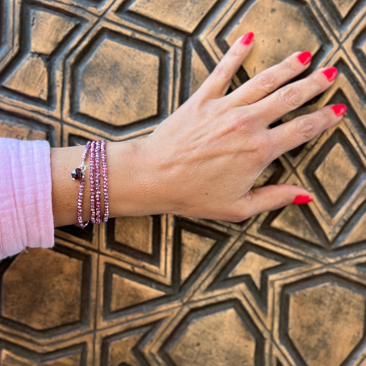 Woman wearing the Live Life Happy: Pink Crystal Wrap Bracelet