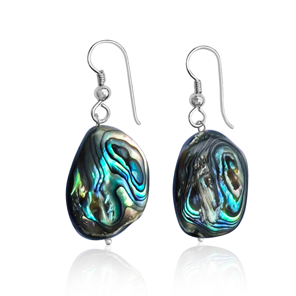 "Coastal Treasures" is a pair of earrings that celebrates the raw and untamed beauty of nature. 