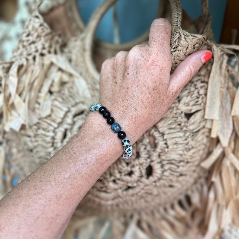 The Mindful Transitions Bracelet is a delightful and meaningful piece of jewelry that's all about helping you gracefully navigate life's ups and downs. 