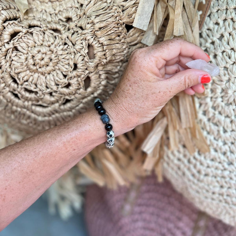 The Mindful Transitions Bracelet is a delightful and meaningful piece of jewelry that's all about helping you gracefully navigate life's ups and downs. 