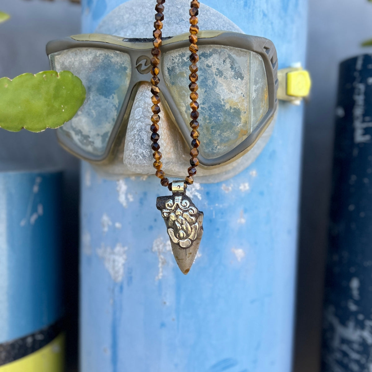 This Megalodon Shark Tooth Necklace is for the adrenaline hunters and shark lovers—anyone who understands that apex predators don't apologize for their power.