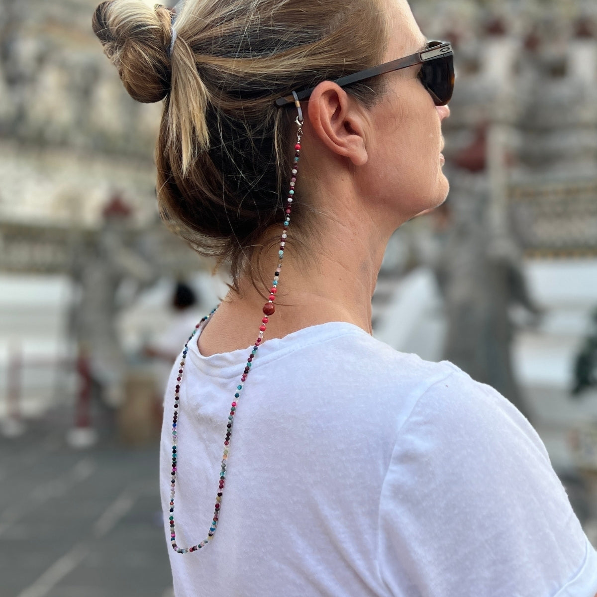 Elevate your eyewear game with our Free Spirit Gemstone Eyewear Holder, a vibrant accessory designed to add a pop of color and personality to your sunglasses or reading glasses.