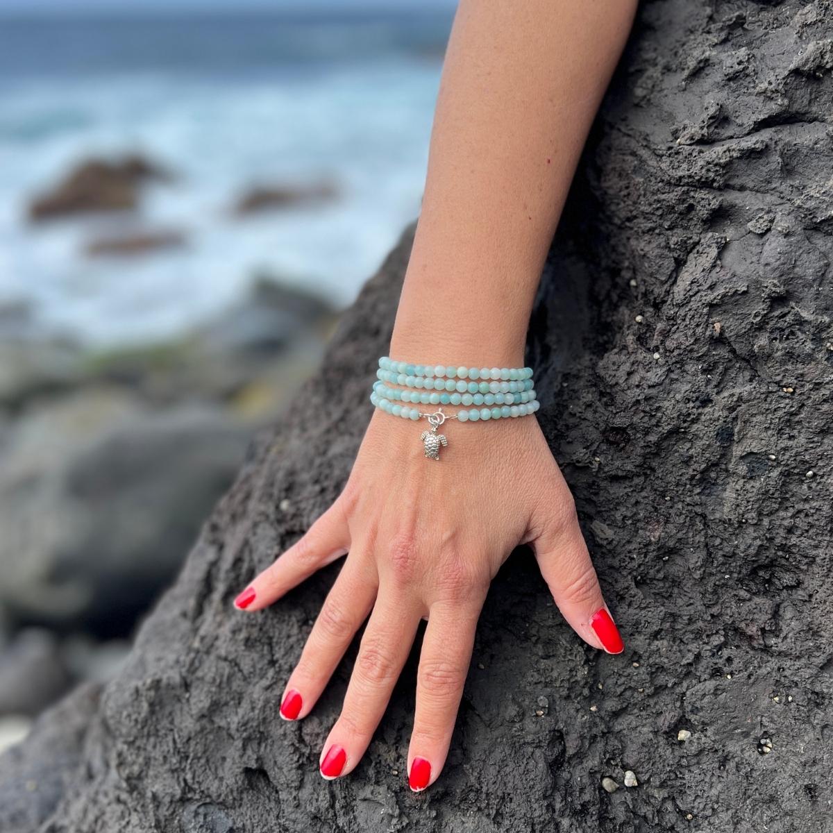 This Turtle Tracks Amazonite Wrap Bracelet symbolizes the journey of a turtle from hatching on the beach in Borneo to swimming out into the vast ocean.