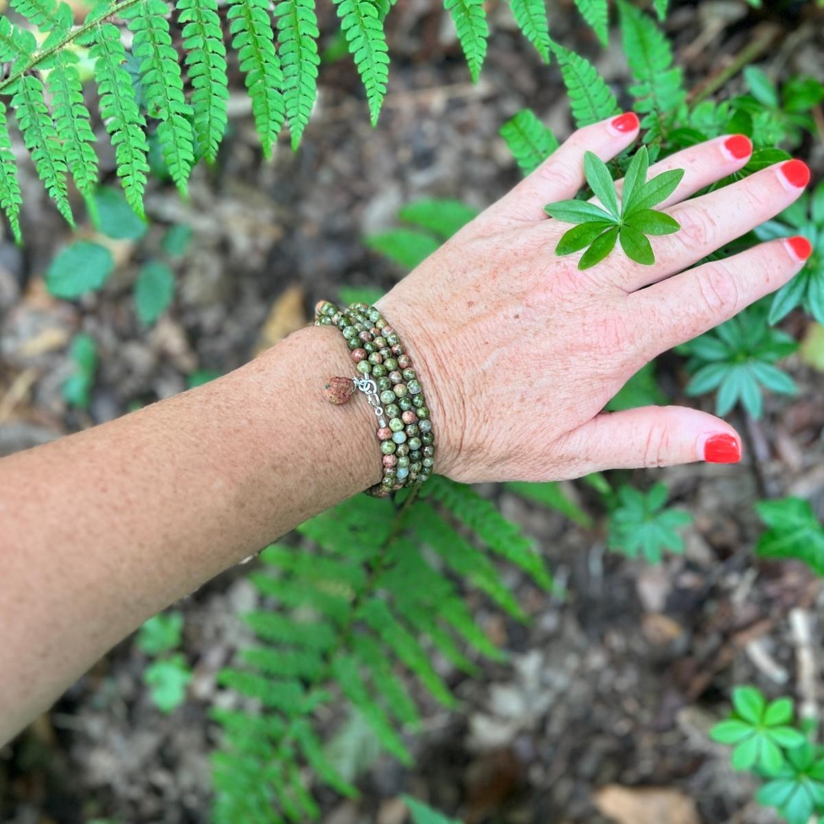 Experience the harmonious connections and deep healing energies of our Unakite Harmony Wrap Bracelet. Crafted from the beautiful Unakite gemstone, this bracelet combines the soothing vitality of greens with the affection and empathy of pinks, creating a powerful fusion of energies.